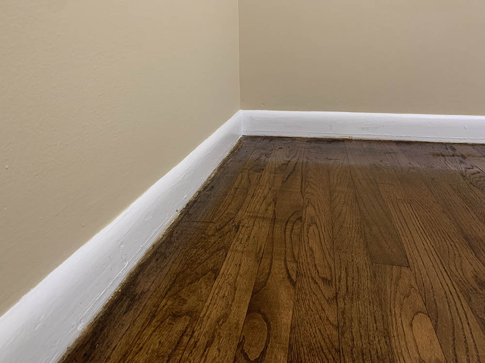 Completed interior wall paint and baseboard trim cut-in in Fayetteville NC